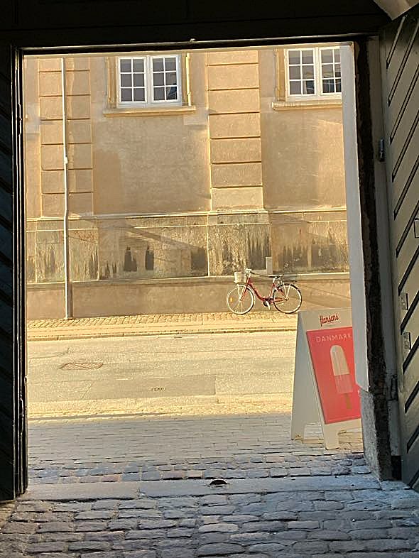 sunlight on Copenhagen street, Denmark city view, nusenses Scandinavian atmosphere